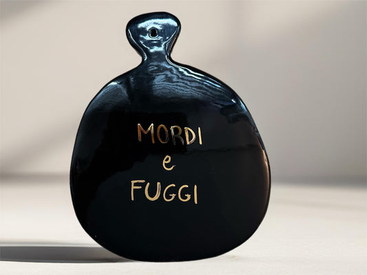 Tagliere decorativo "Mordi e fuggi"