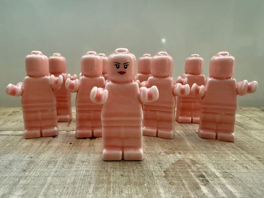 Omino colorato rosa cipria